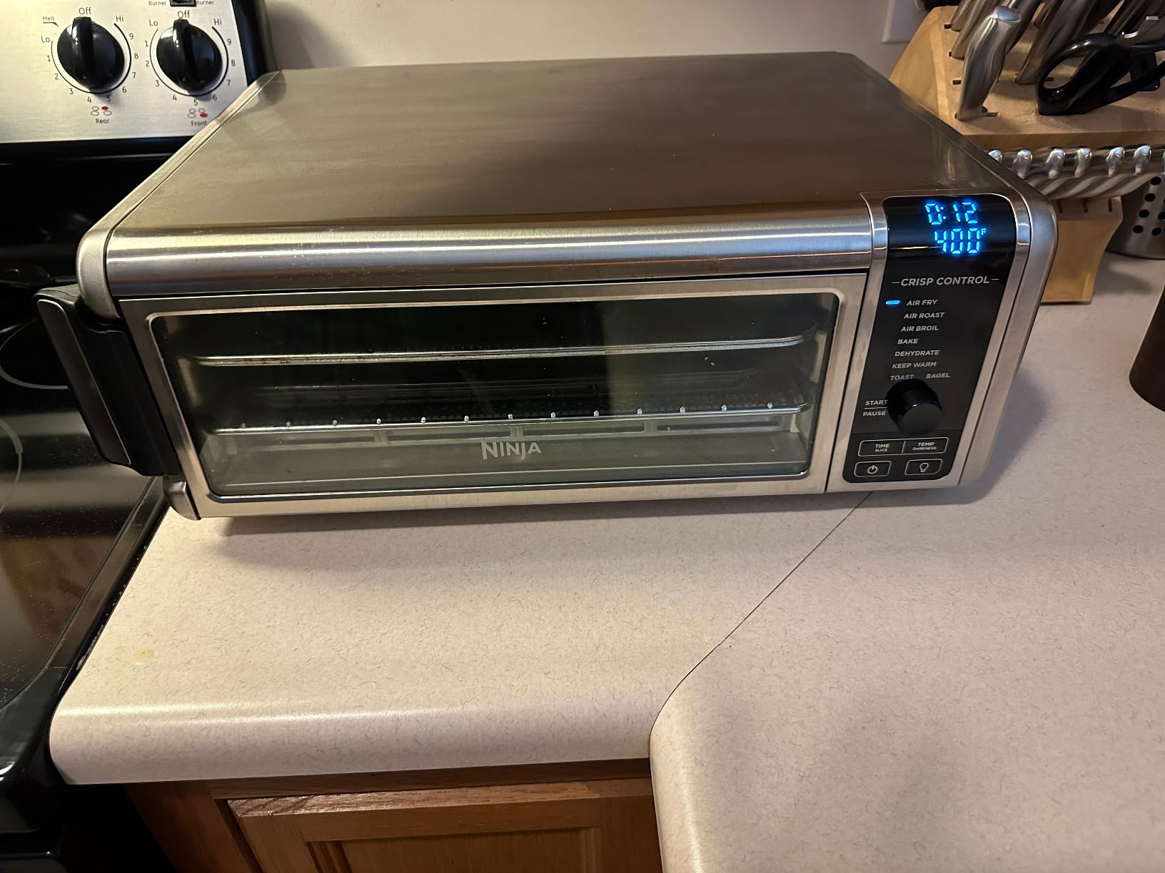 Ninja Air Fryer Toaster Oven Combo | 8-in-1 Functionality | Flip Up & Away for Storage Space | Air Fry Basket, Sheet Pan, Wire Rack & Removable Crumb Tray |1800 Watt | Stainless Steel | SP151 customer photo 2