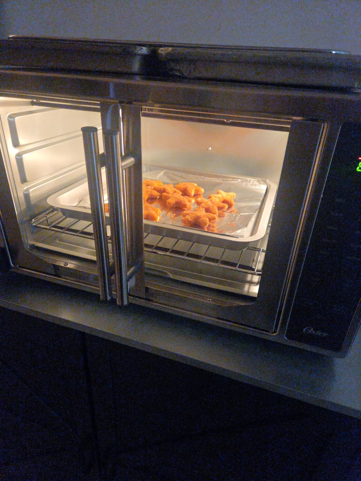 Oster Extra Large 42L French Door Countertop Toaster Oven, 10-in-1 Air Fryer Oven, with Air Fry Rack, Wire Rack, Baking Pan and Crumb Tray, Stainless Steel customer photo 1