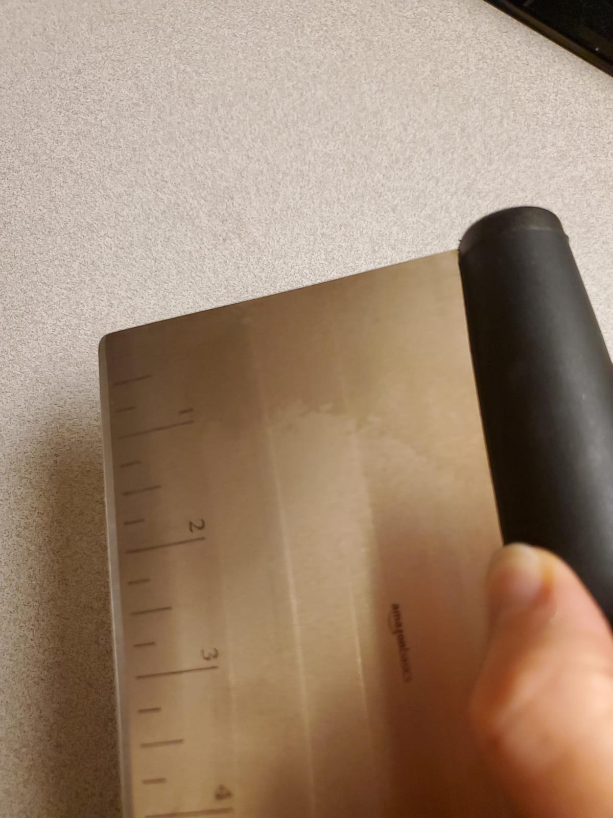 Amazon Basics Multi-Purpose Bench Scraper, Stainless Steel Dough Cutter with Measurement Marks, Dishwasher Safe, Non-slip Contoured Grip, 6