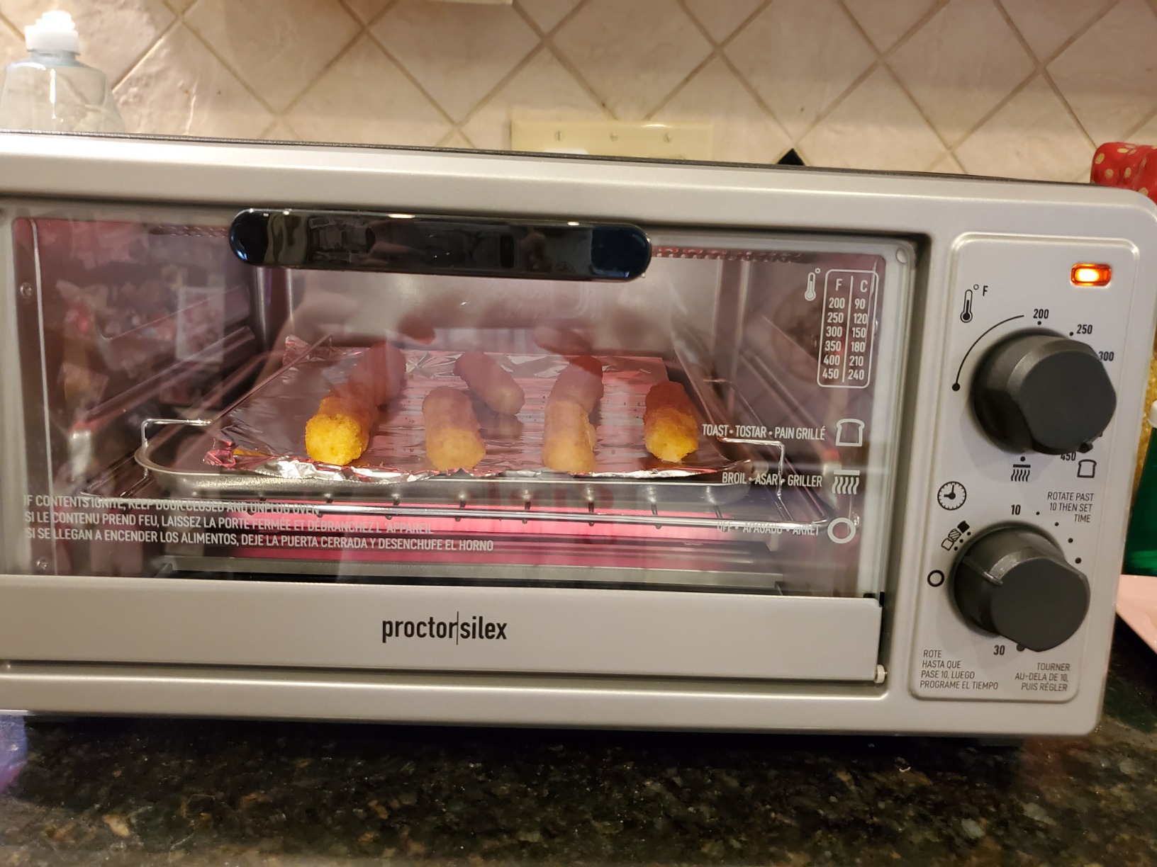 Proctor Silex 4 Slice Countertop Toaster Oven | Bake, Broil, Toast | 200-450⁰F Adjustable Temp | 30 Minute Timer | Automatic Shutoff | Black and Silver | 31260G customer photo 2