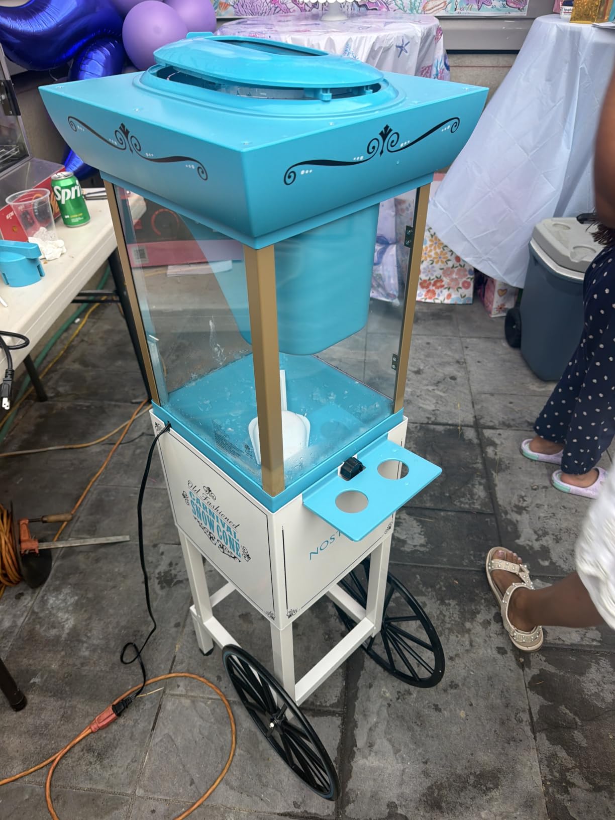 Nostalgia Snow Cone Shaved Ice Machine - Retro Cart Slushie Machine Makes 72 Icy Treats - Includes Metal Scoop, 2 Syrup Bottles, 100 Paper Cups/Spoons, Storage Compartment, Wheels - Blue, 54