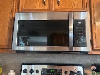 24 in. Stellar Coll 1.3 cu ft Over the Range Microwave, Vent Fan, Stainless customer photo 1