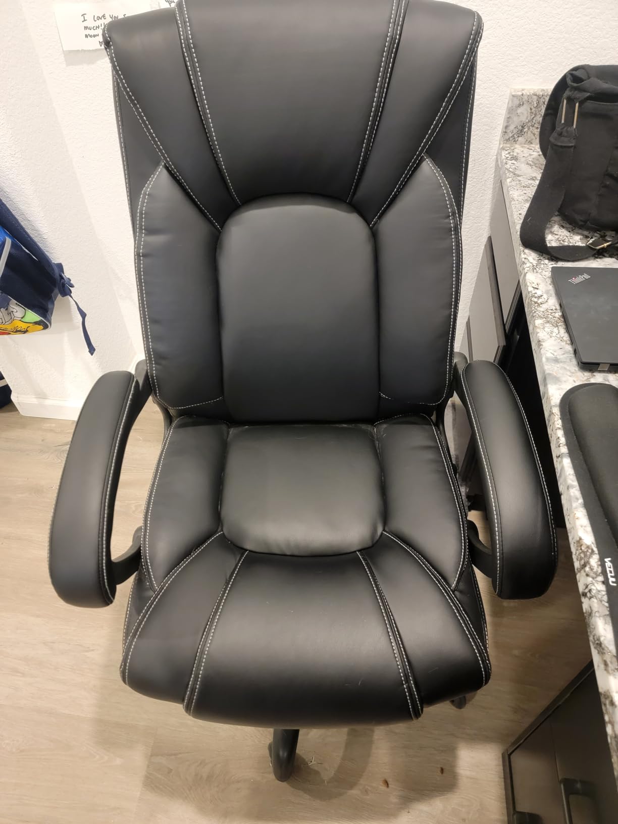 OUTFINE Office Chair Executive Office Chair Desk Chair Computer Chair with 5-Year hydrolysis-Resistant Leather Spring Cushion Ergonomic Support Tilting Function Upholstered in Bonded Leather Black customer photo 1